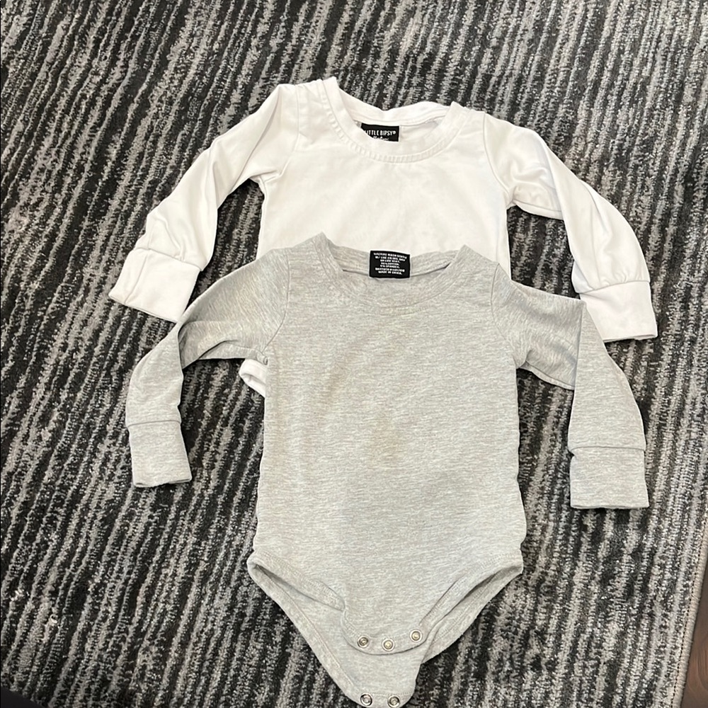 Little Bipsy long sleeve one pieces in white and gray